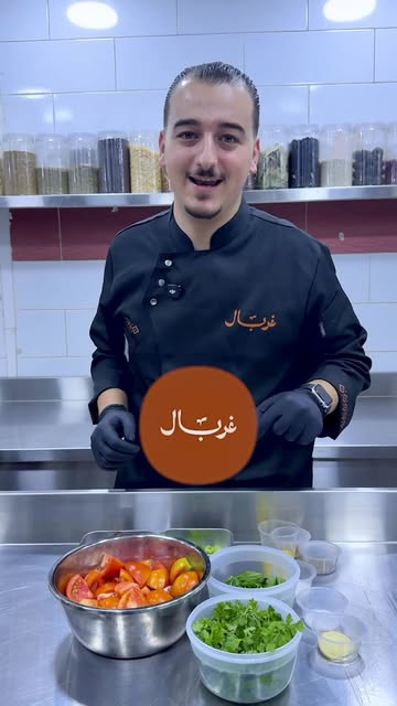 Chef Khalid preparing ingredients in Ghirbaal's kitchen